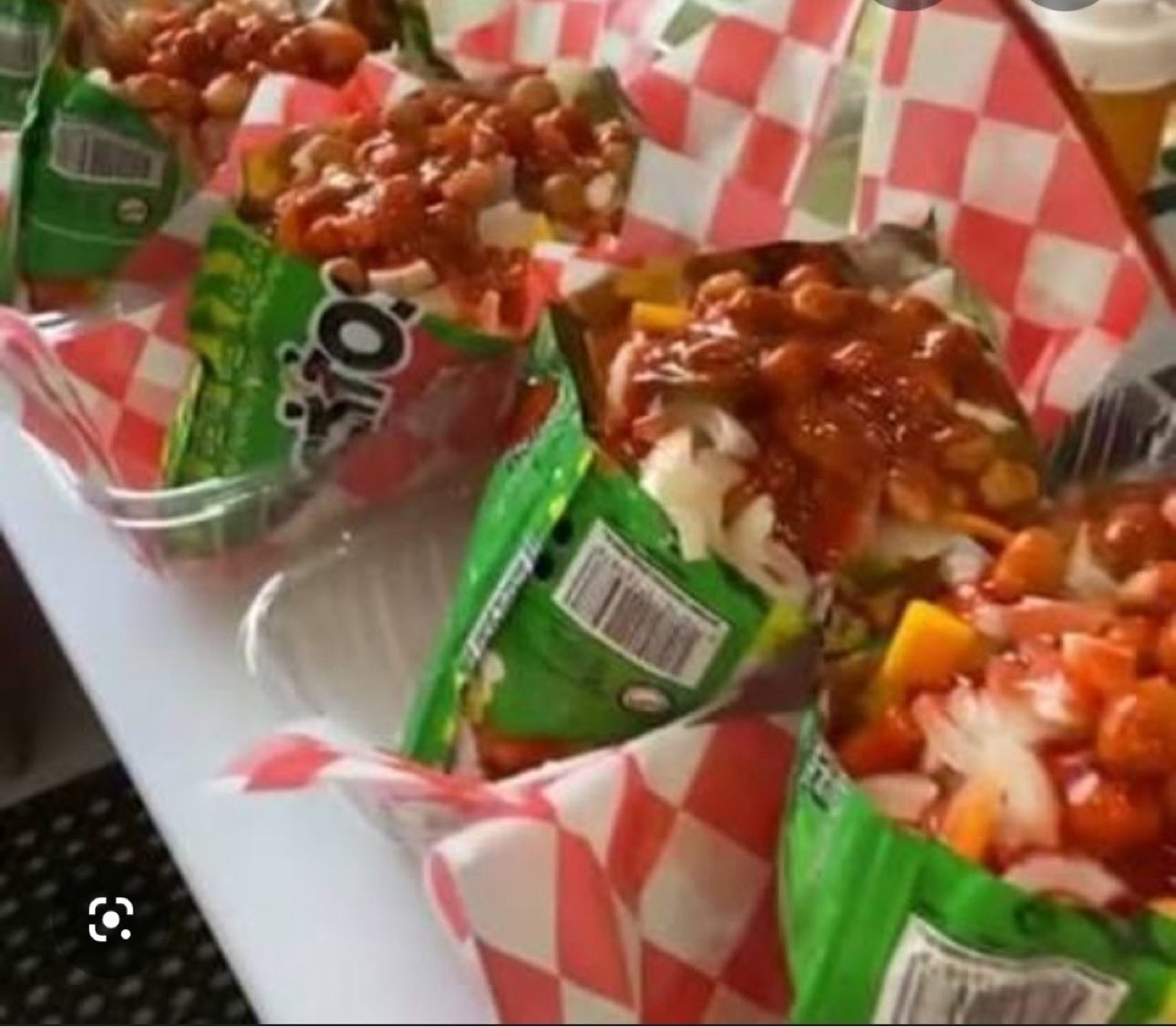 Tostilocos prepared with cueritos and chamoy